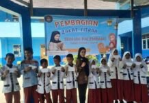Yanita Aquarena: Program Zakat Fitrah SDN 106 Palembang Bangun Karakter Peduli Siswa